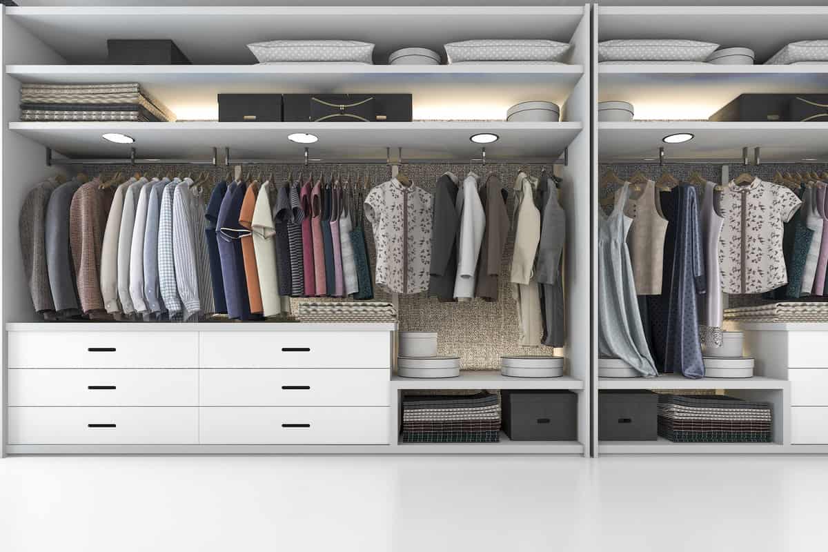 A modern Scandinavian white wood walk-in closet, featuring minimalist design and natural elegance.